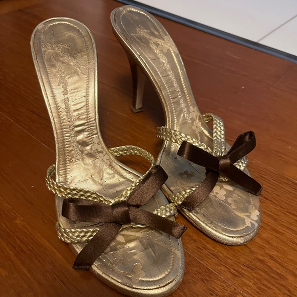 Giuseppe Zanotti Shoes - Giuseppe Zanetti gold sandals with brown bow.